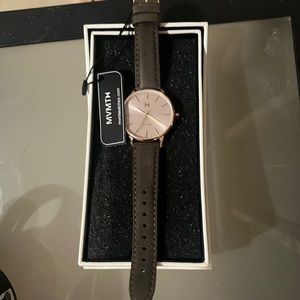 Brand new gray and rose gold MVMT watch